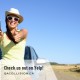 Check us out on Yelp! - Woman giving thumbs up while sitting on the hood of a car