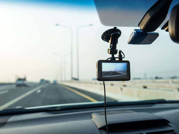 A car with a camera on the windshield